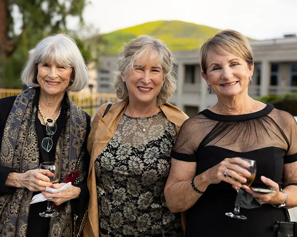 A group of women posing for a picture