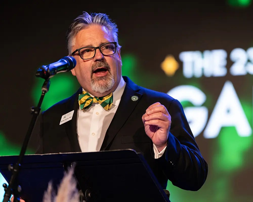 A man speaking into a microphone