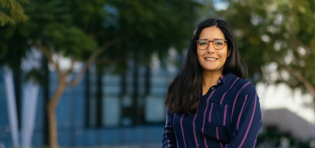 A woman smiling at camera