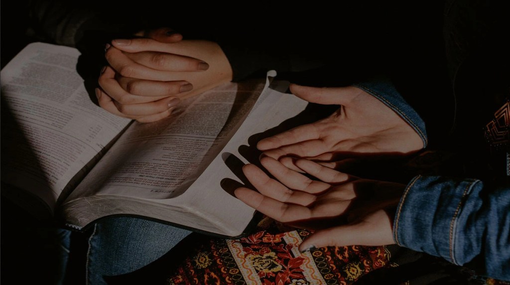 Two people praying