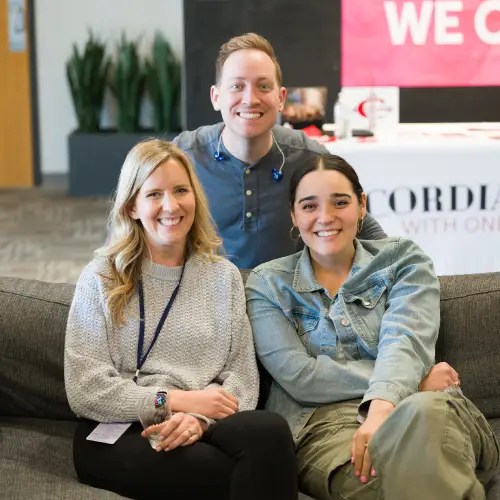 A group of people sitting on a couch