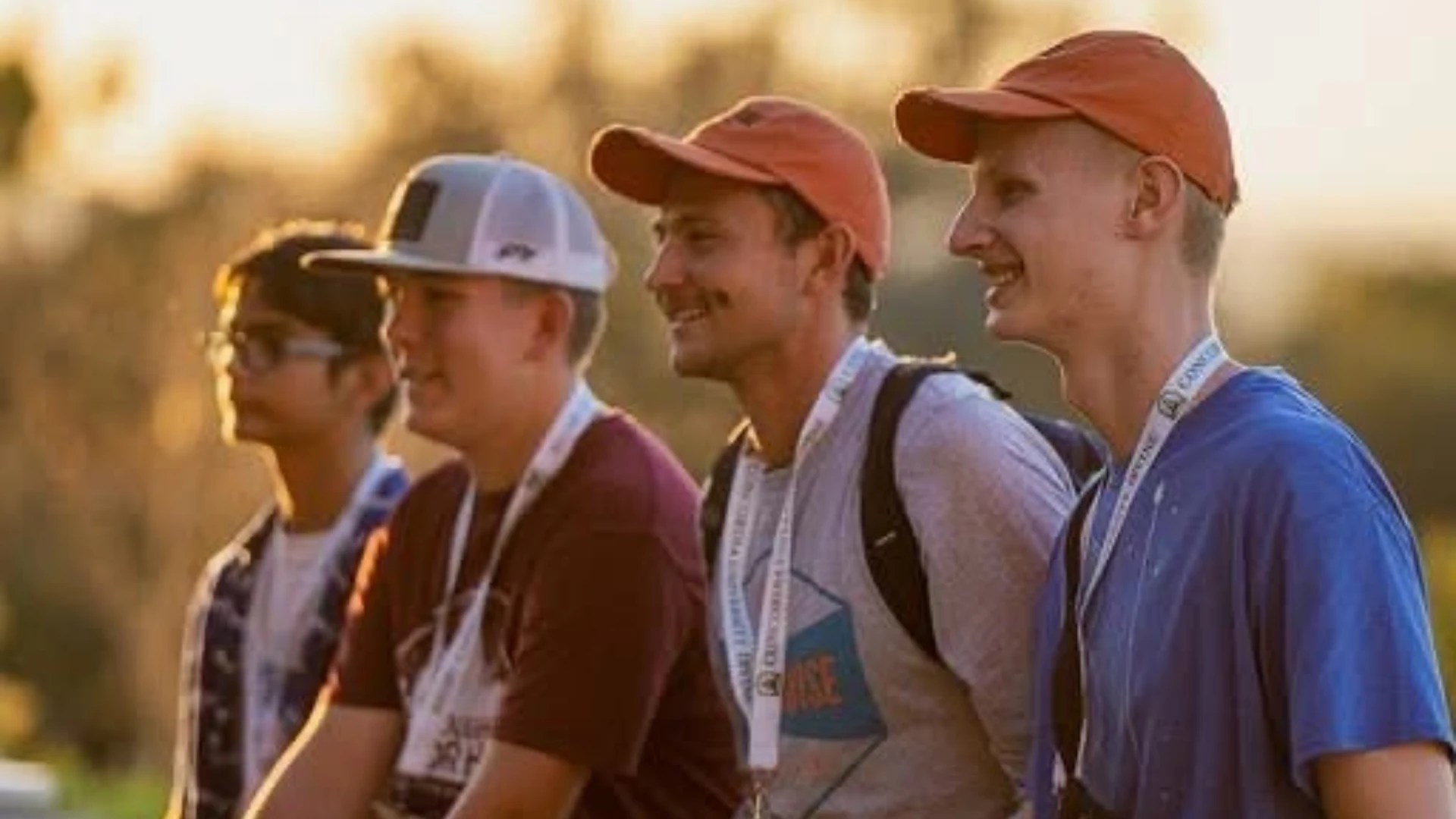 A group of men wearing hats
