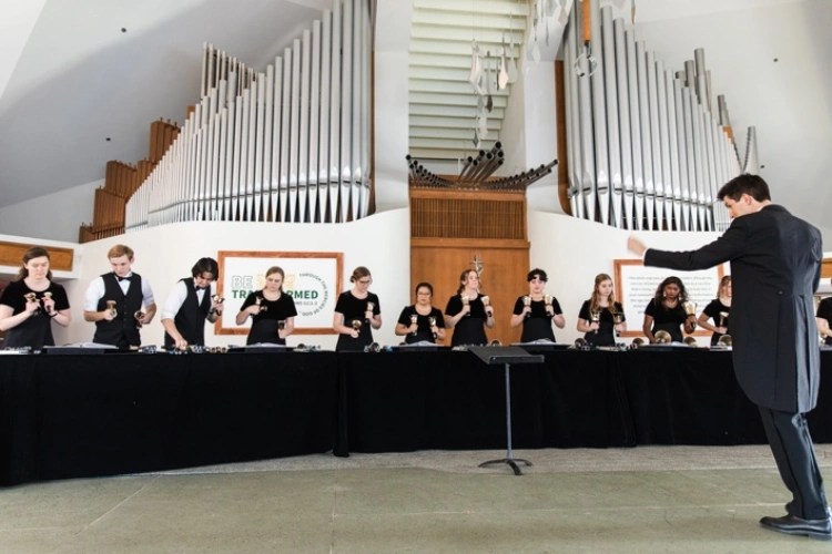 A group of people performing on a stage
