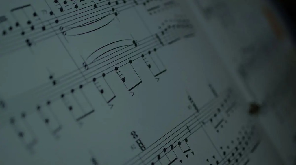 A sheet of music with hymns