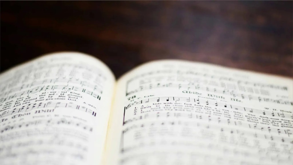 An open book with music notes