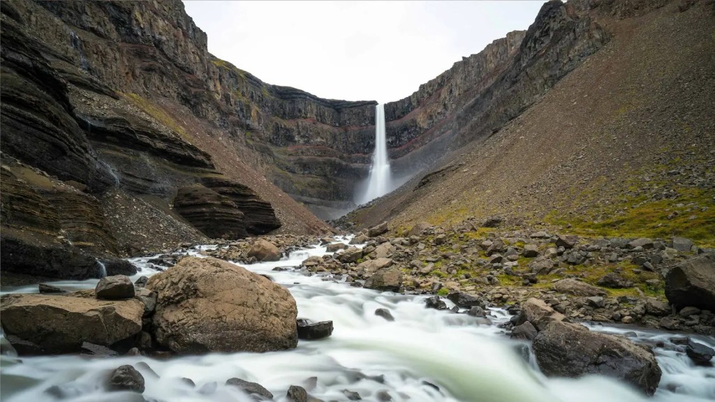 A waterfall in a canyon