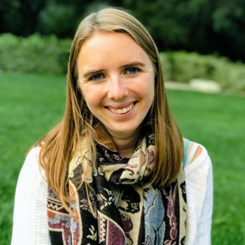 A woman smiling at the camera