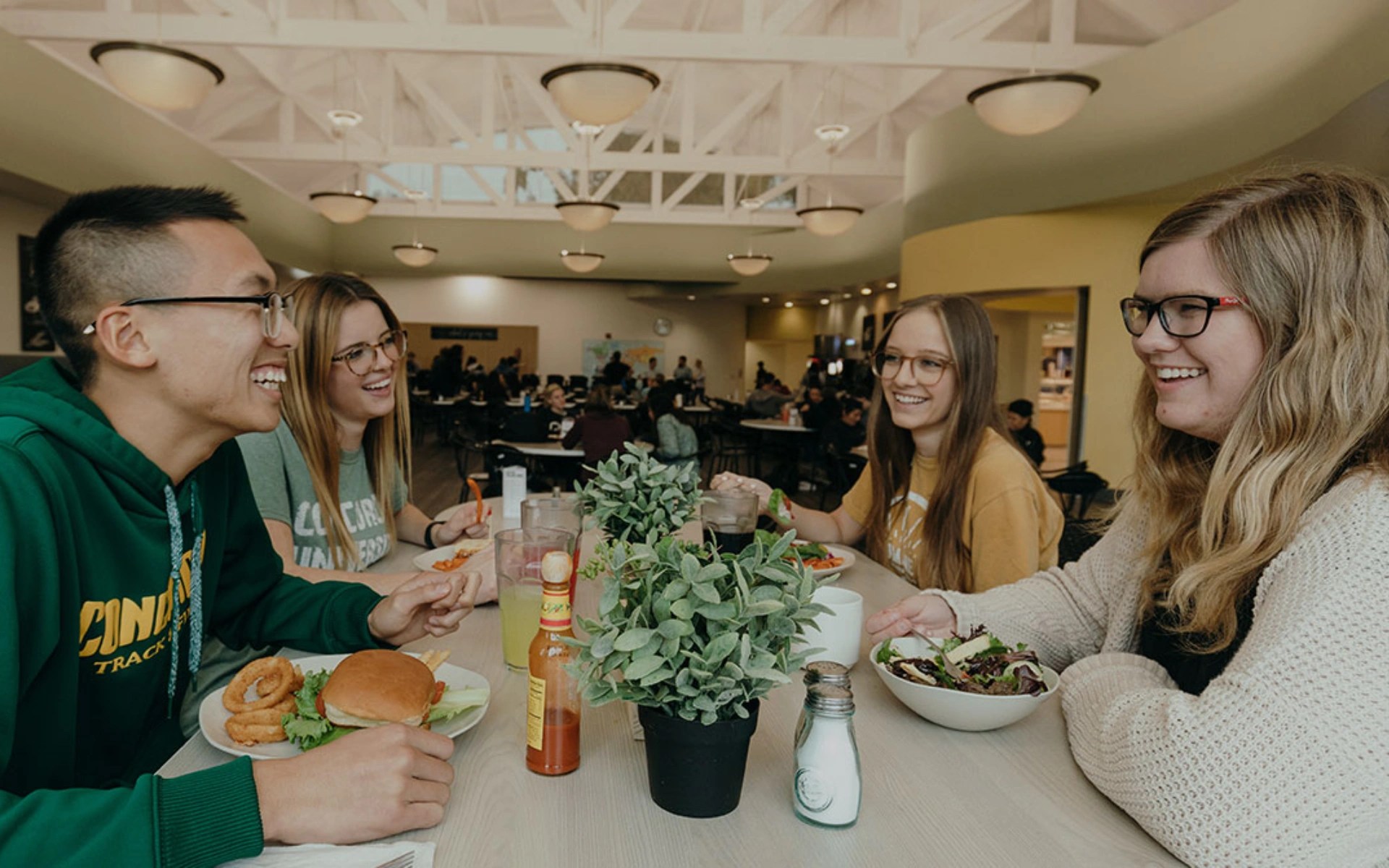 A group of people sitting at a table