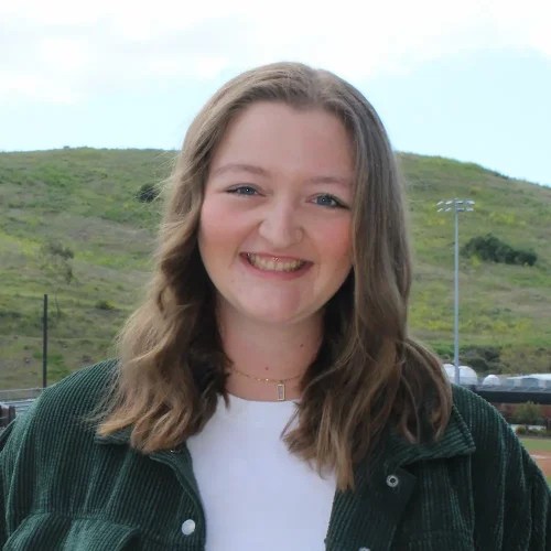 A woman smiling at camera