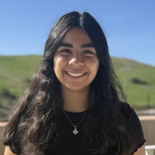 A woman smiling for the camera