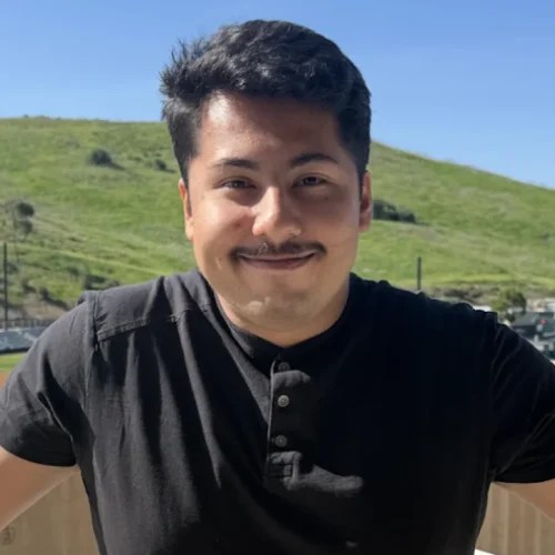 A man smiling for a picture