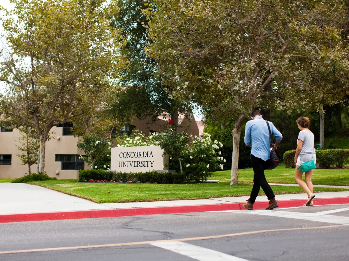 A group of people crossing the street