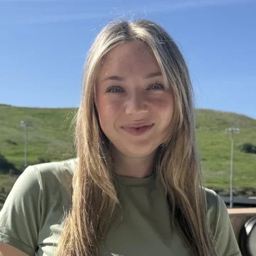 A woman smiling for a picture