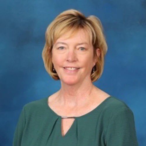 A woman in a green shirt