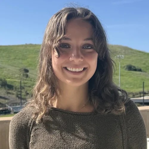 A woman smiling at camera