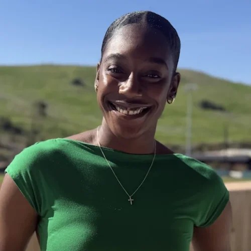 A woman in a green shirt