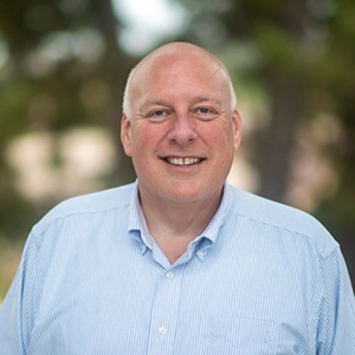 A man smiling for a picture