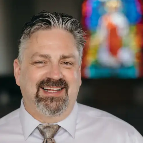 A man smiling for the camera