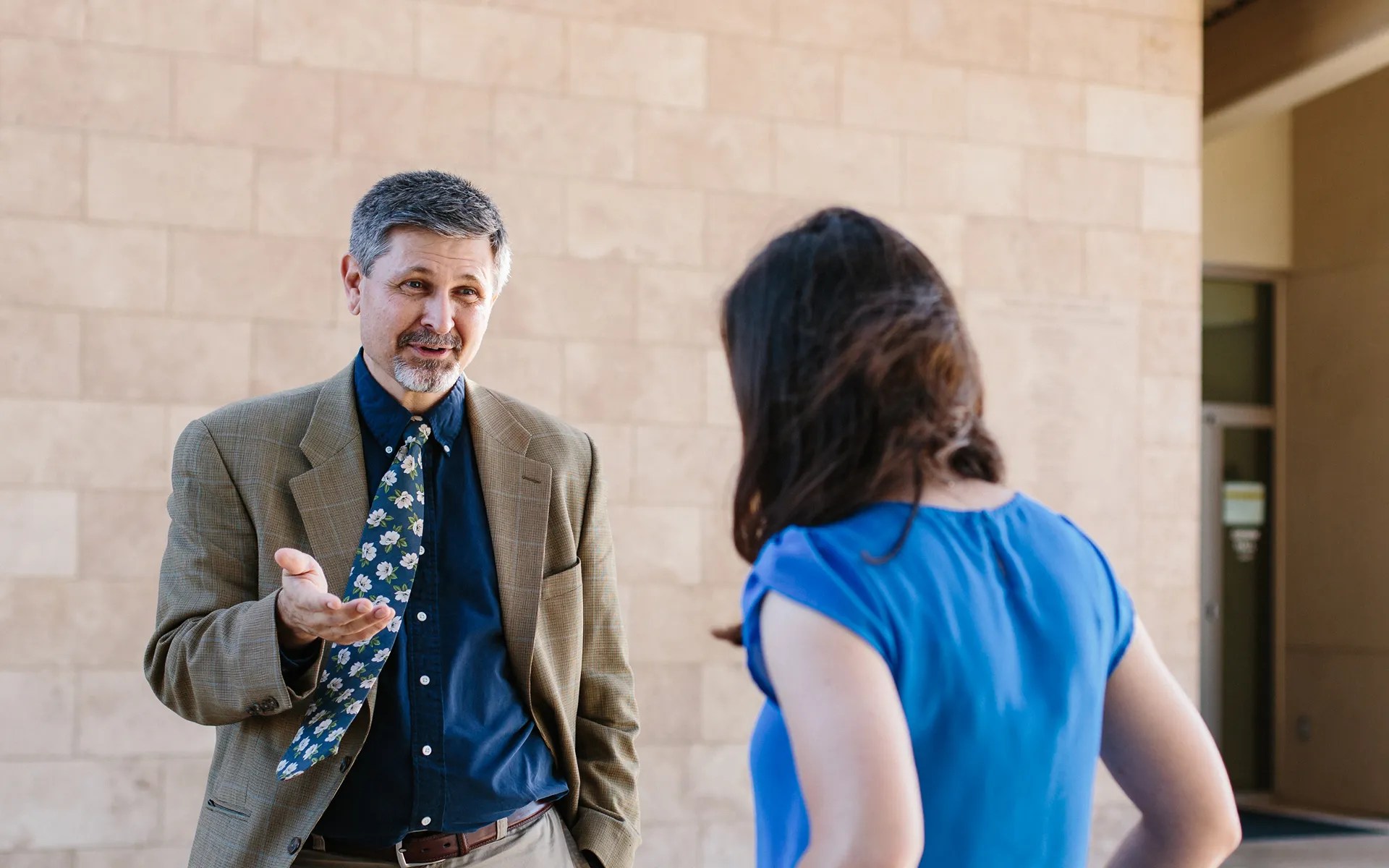 A man and woman talking