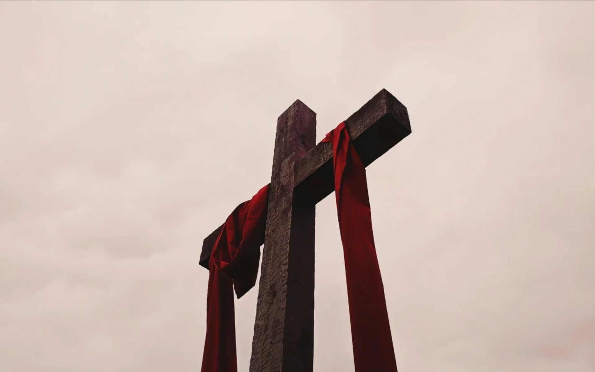 A cross with red cloth from it