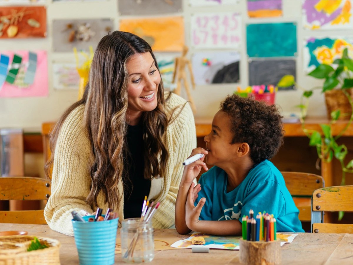 A woman and a child sitting at a table