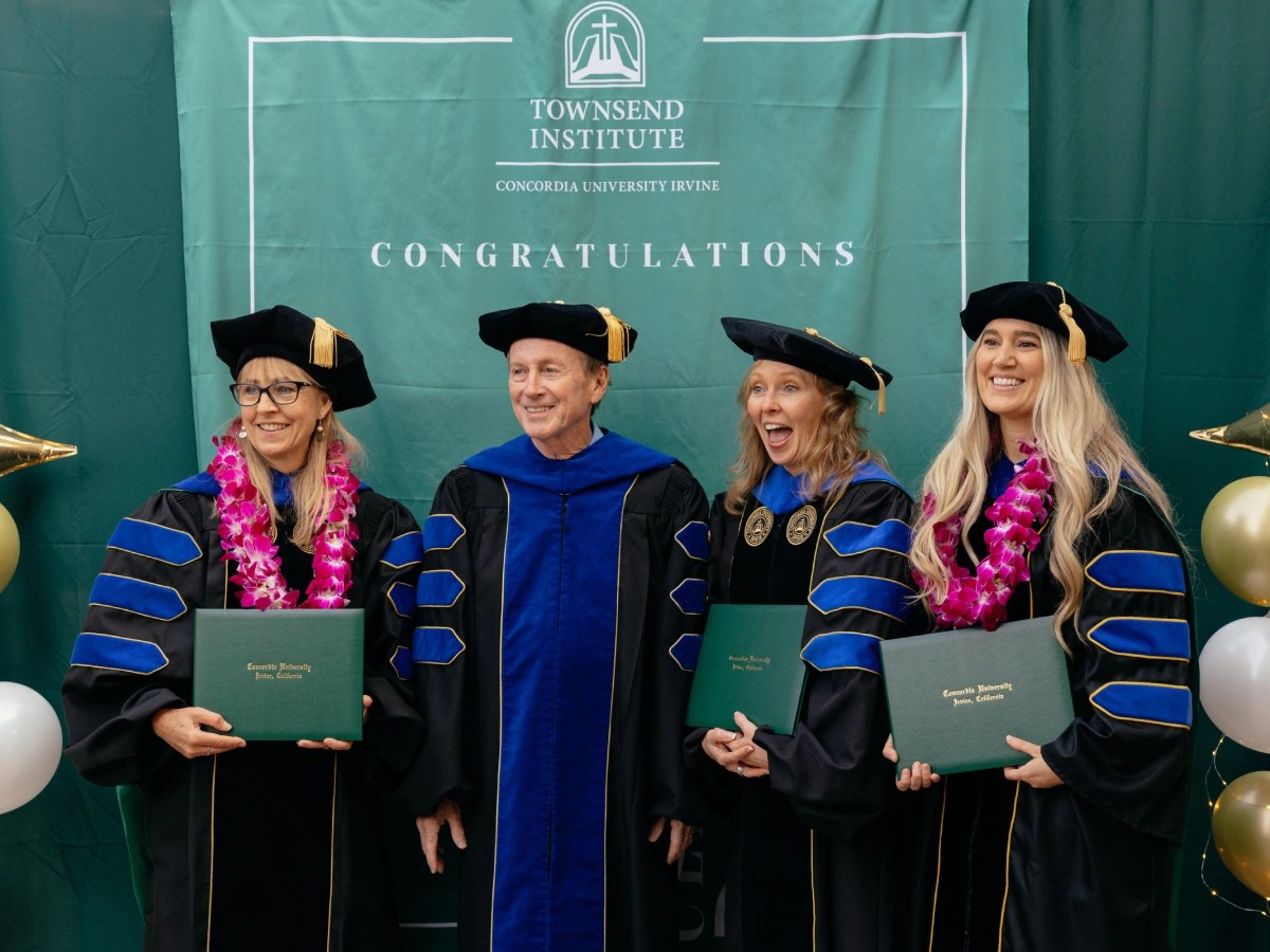 A group of people in graduation gowns