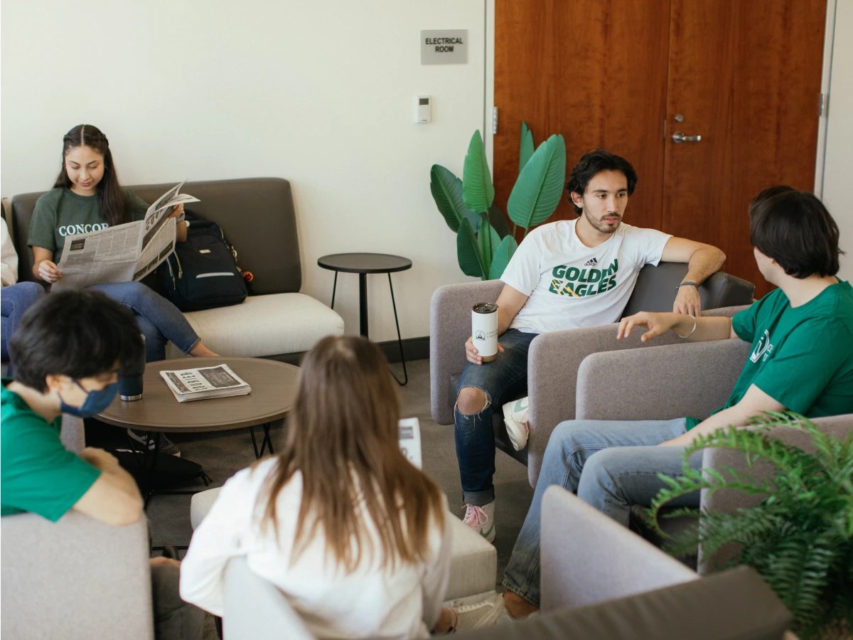A group of people sitting in chairs