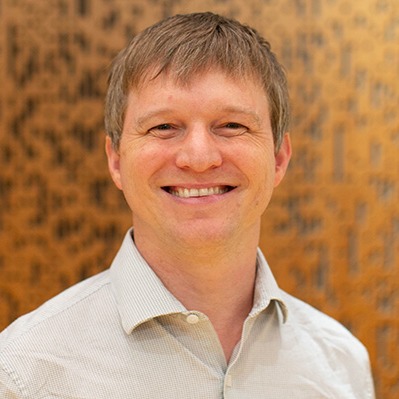 A man smiling at the camera