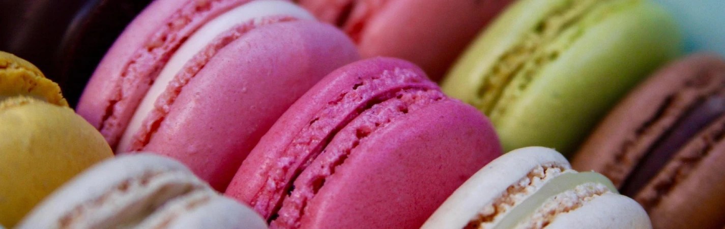 Close up of pink and white macaroons