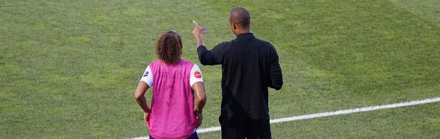 A man and woman on a field