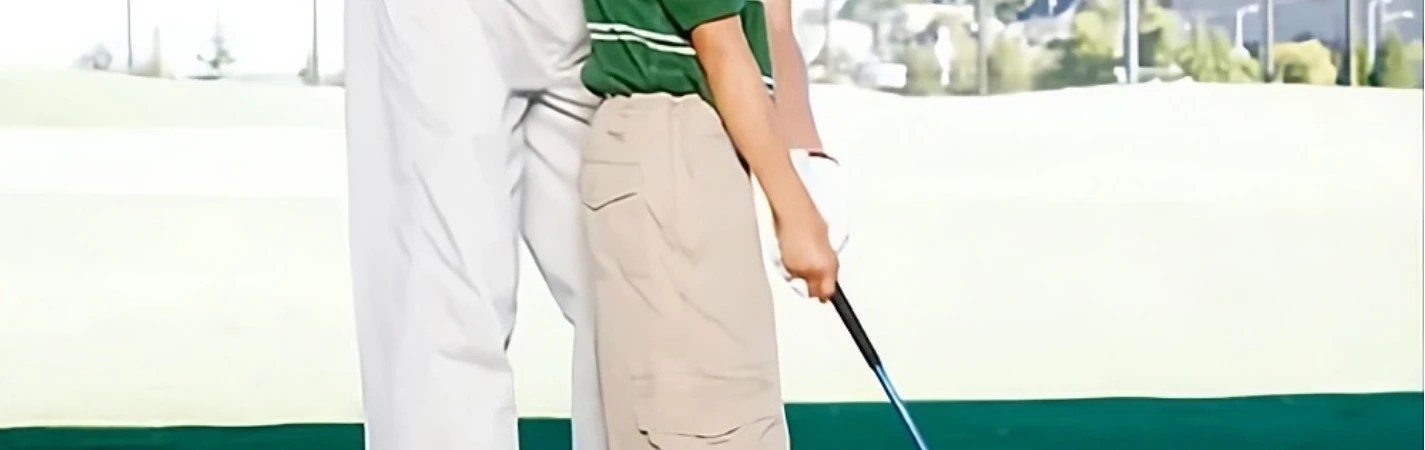 A person holding a golf club