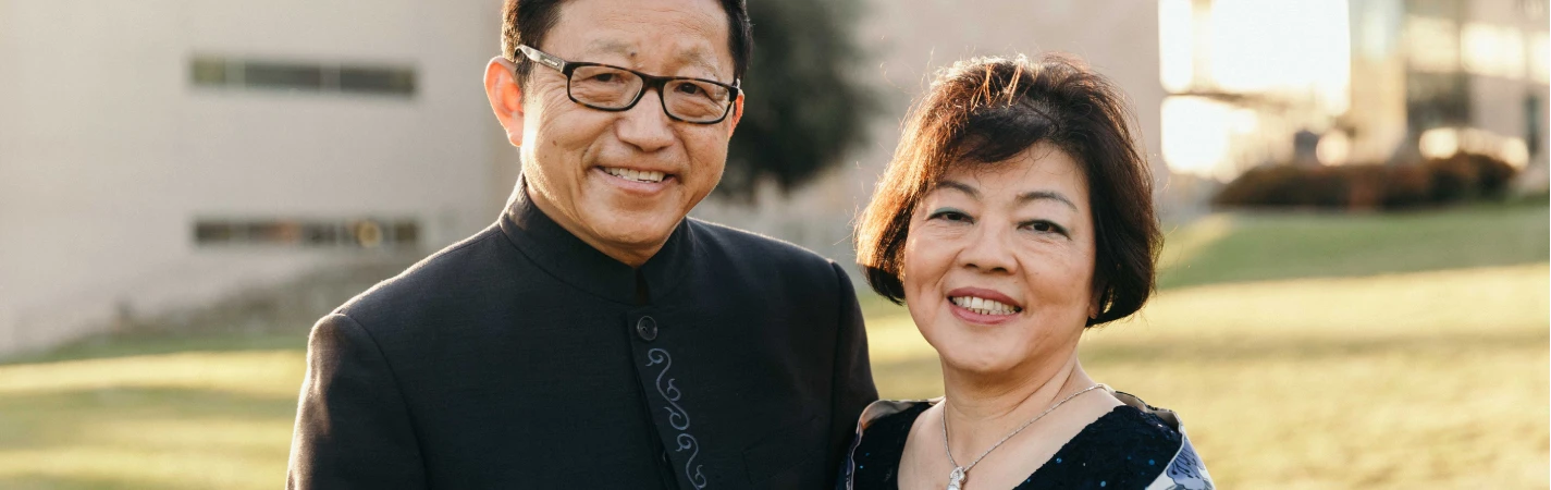 A man and woman smiling for a picture