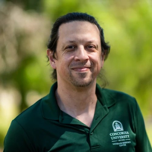 A man in a green shirt