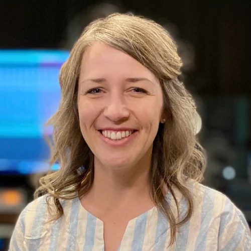 A woman smiling at the camera