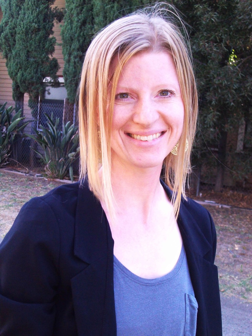 A woman smiling for a picture