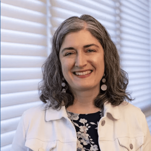 A woman smiling at camera