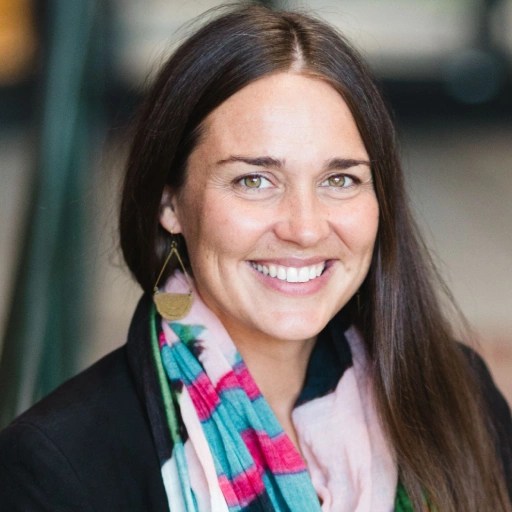 A woman smiling at the camera