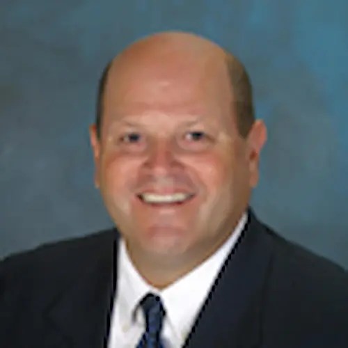 A man in a suit and tie