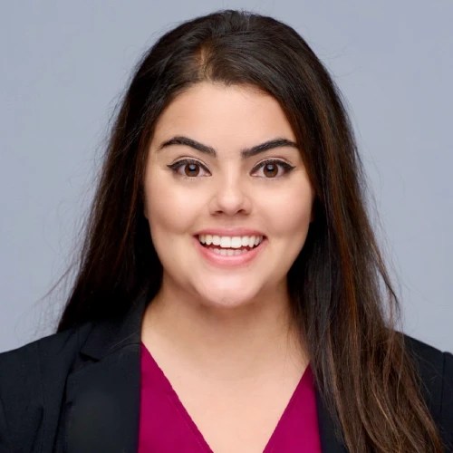 A woman smiling at camera