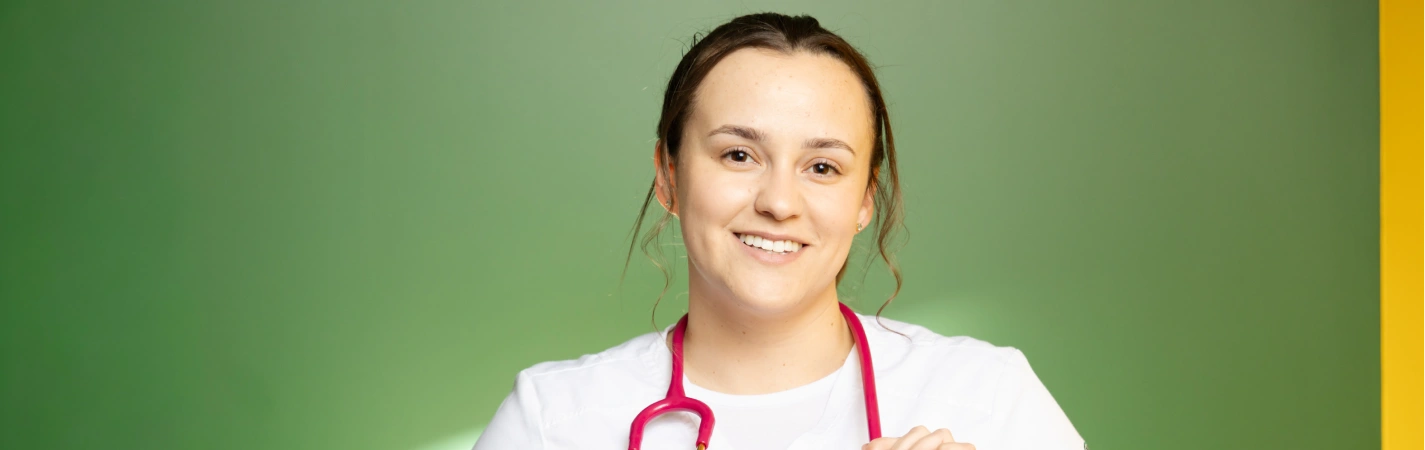 A woman wearing a stethoscope