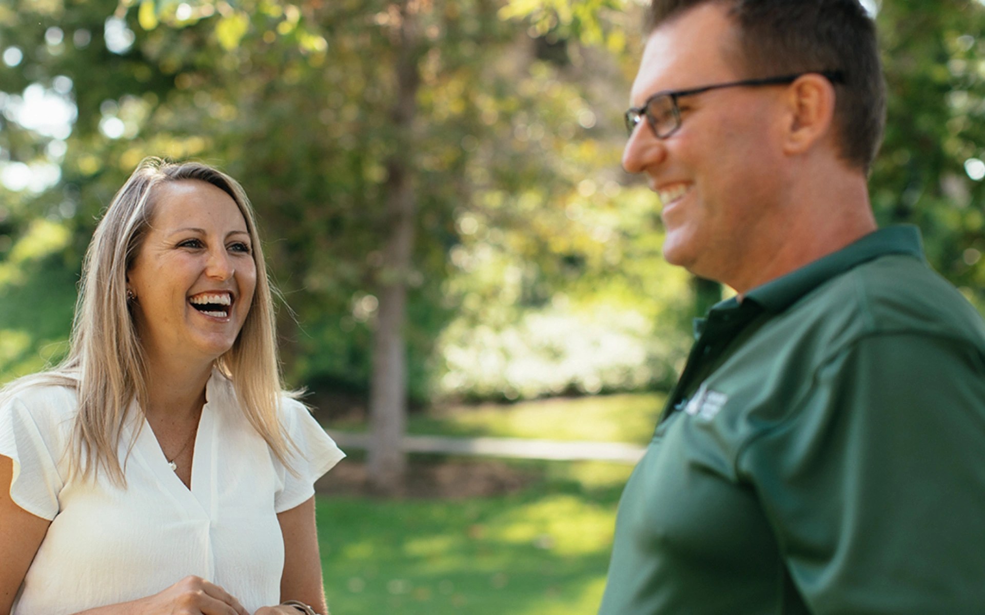 A man and woman laughing