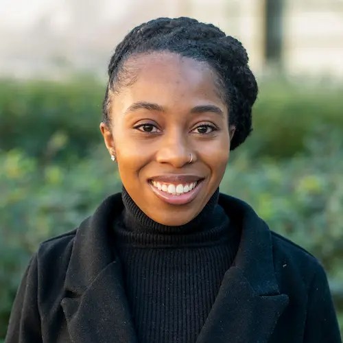 A woman smiling for a picture