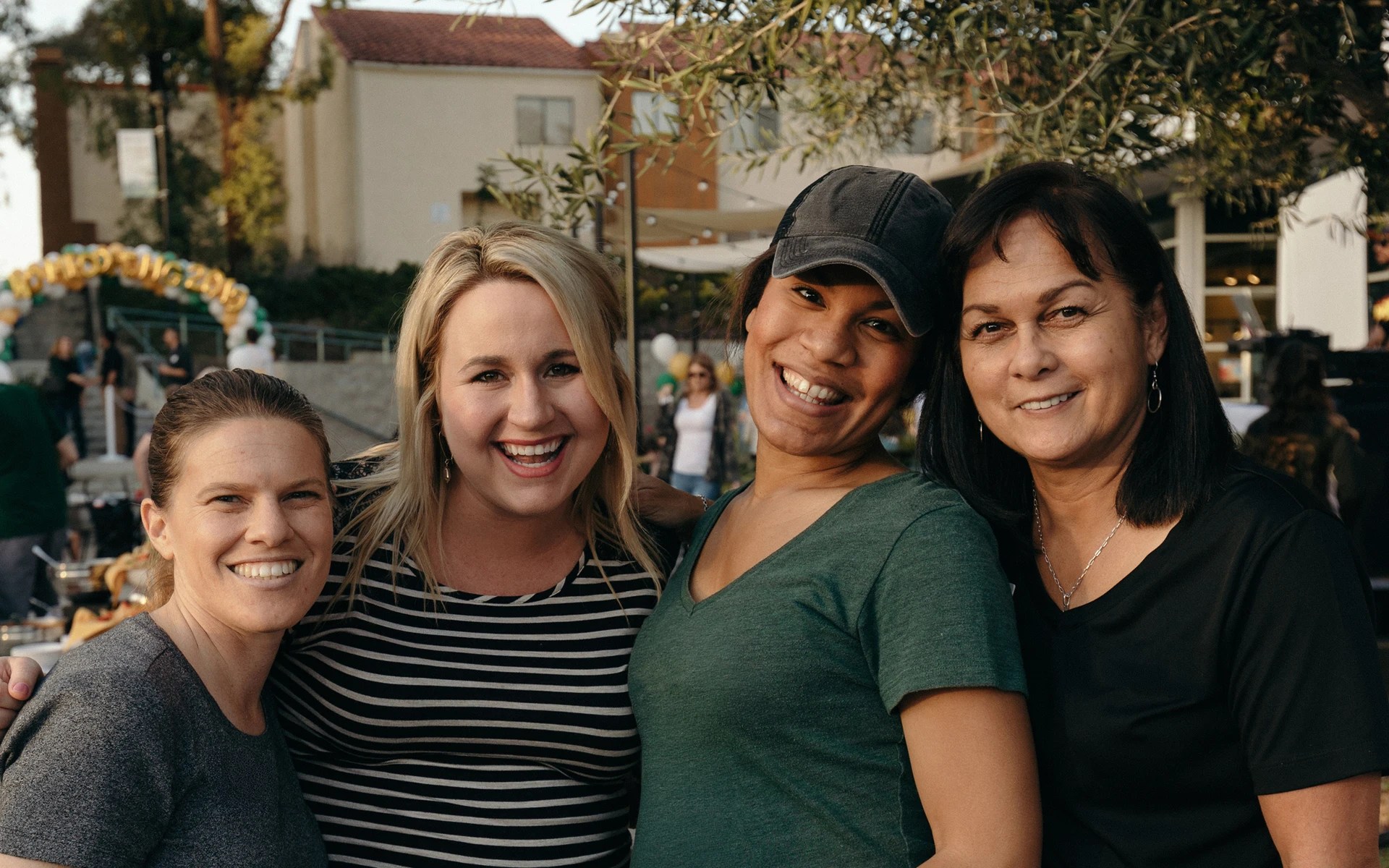 A group of women posing for a picture