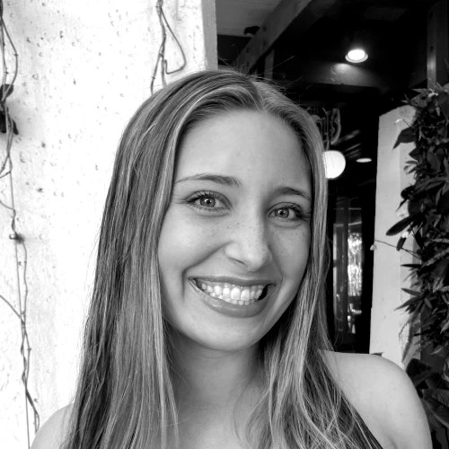 A woman smiling at the camera