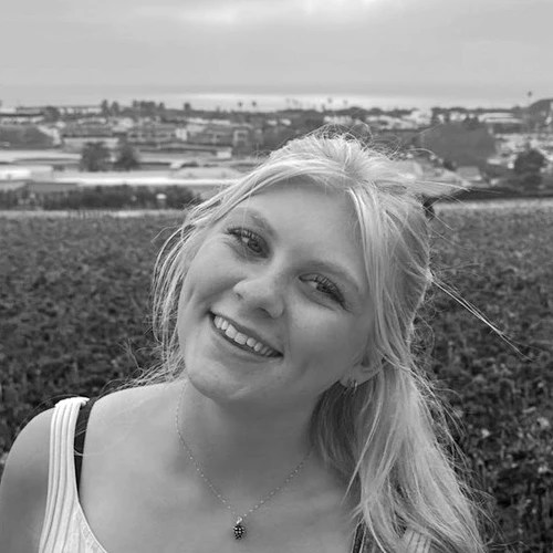 A woman smiling at the camera
