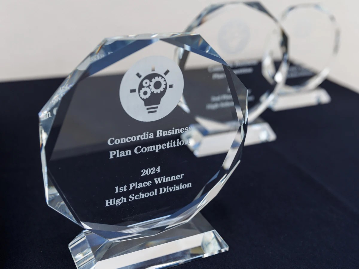 A group of glass trophies