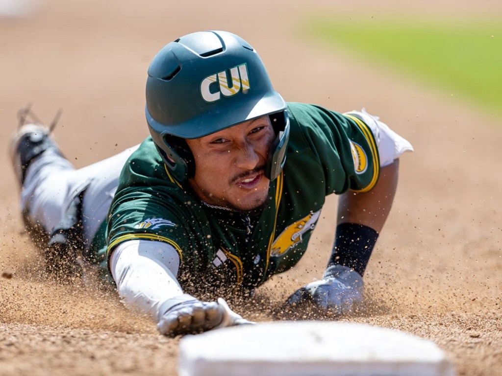 A man sliding into a base