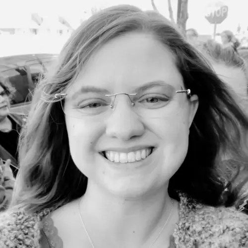 A woman smiling for a picture