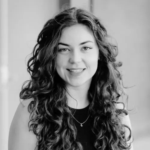 A woman with long curly hair