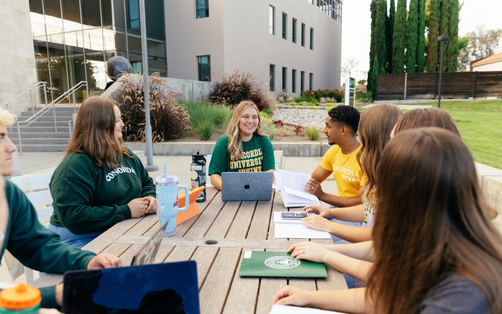 A group of people sitting around a table